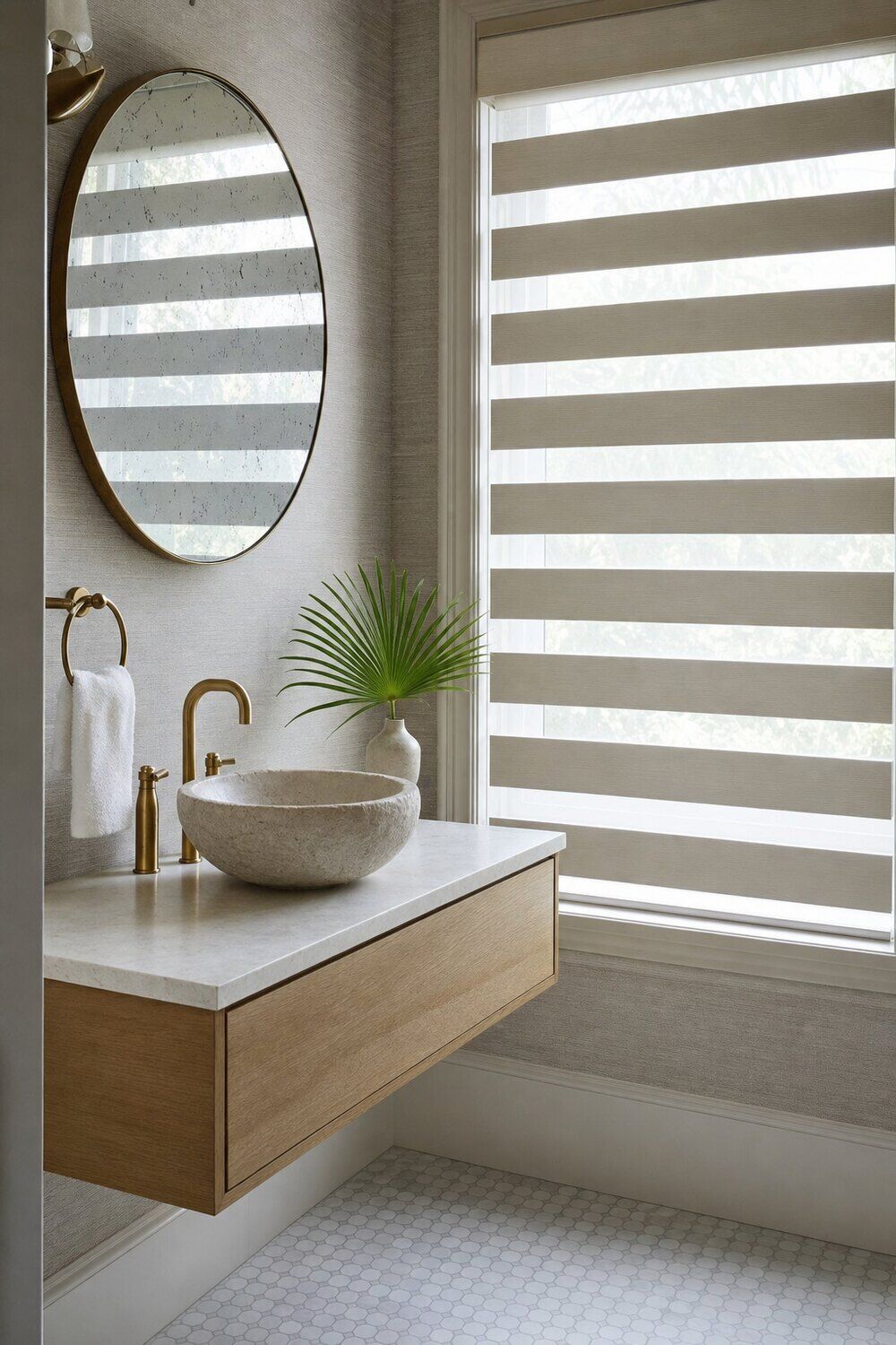 A sunlit room with fabric shades lowered against the light