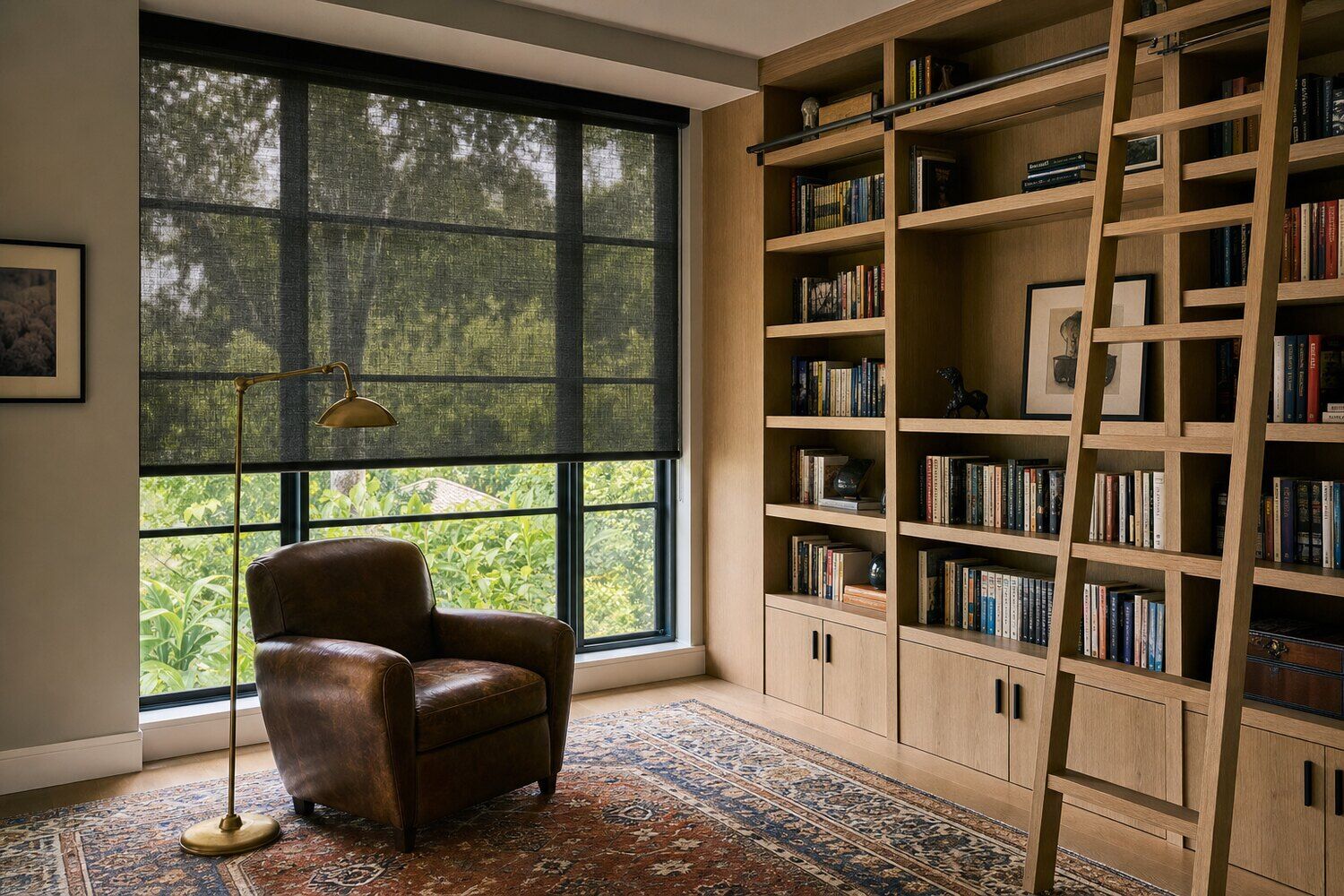 A open-plan room with fabric shades lowered against the light